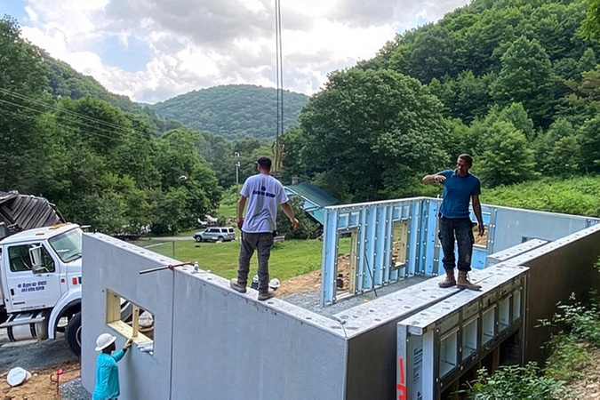App Builds a Home volunteers at the Potter family home during construction.
